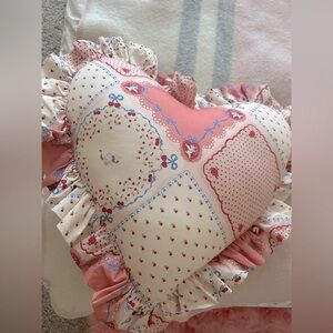 Heart-Shaped Patchwork Pillow urban outfitters